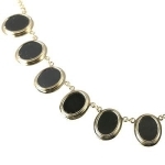 Золотое ожерелье с ониксами Мэрилин Монро